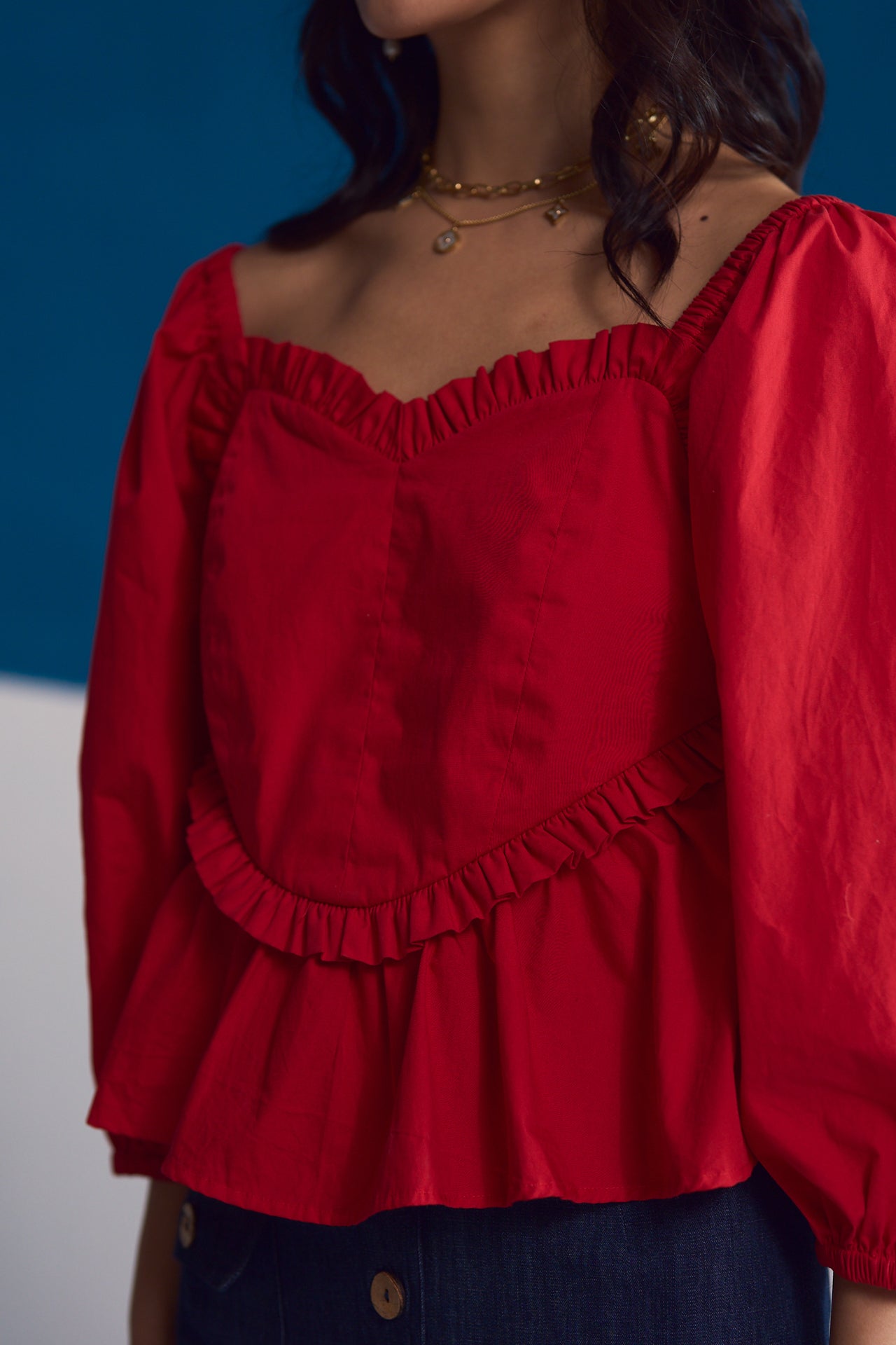 Rosso Ruffle-Trimmed Peplum Top
