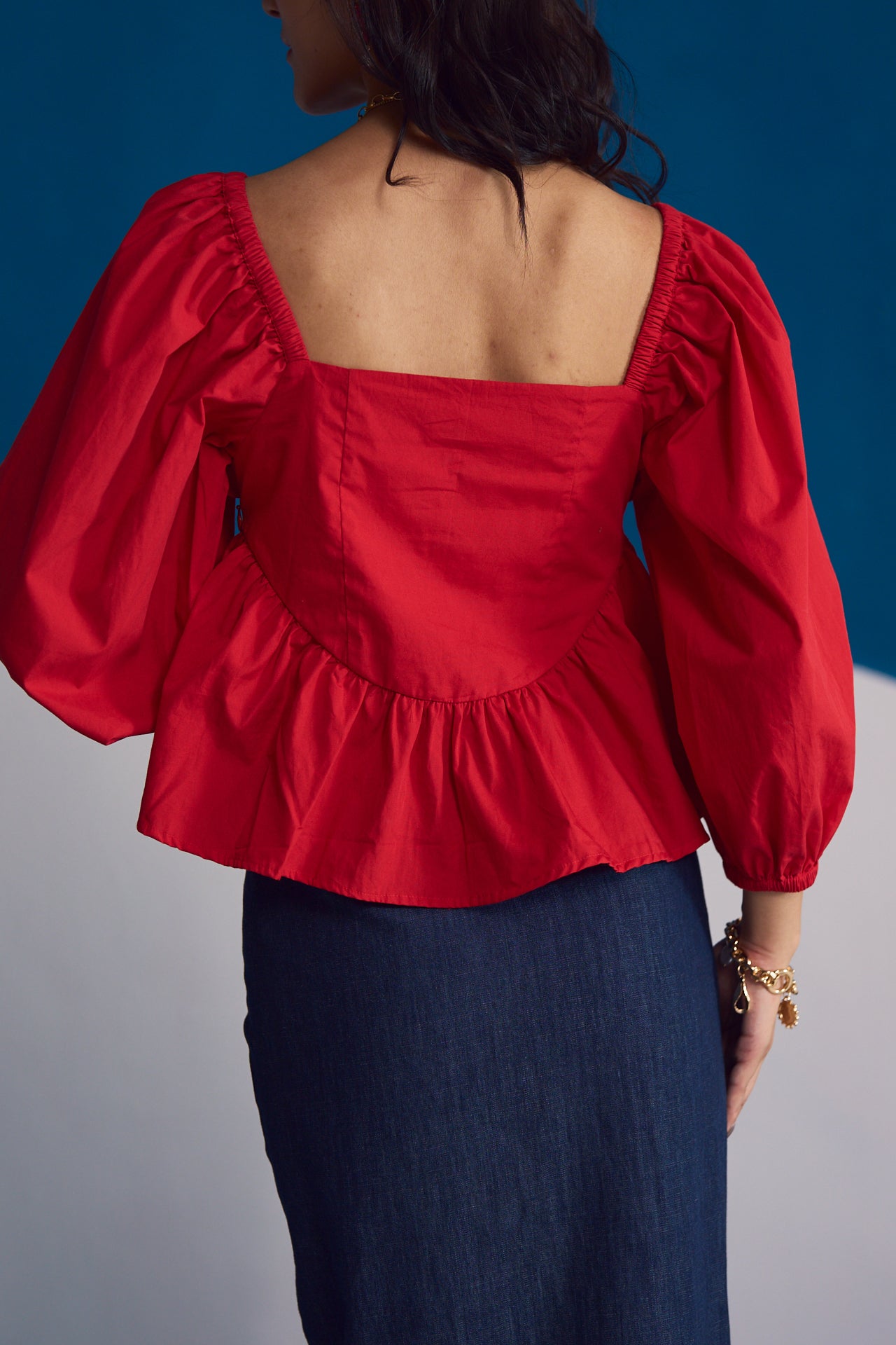 Rosso Ruffle-Trimmed Peplum Top